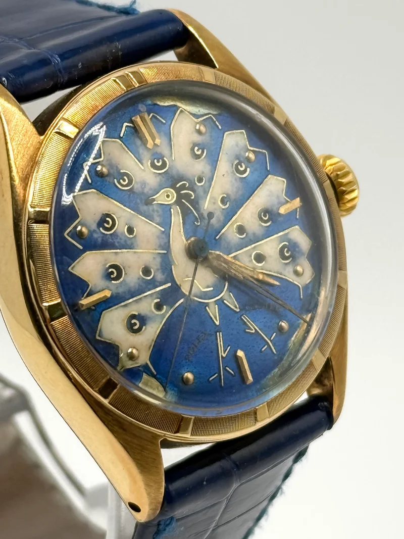Rolex Oyster Perpetual Cloisonnè Peacock Dial