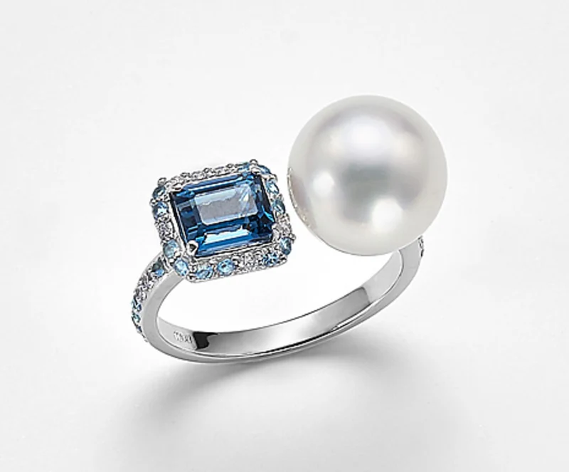 Nihama an 18k sspw 10/11 ct.0,10 diam ,topazi azzurri e t opazio london NA0771O4SABI100