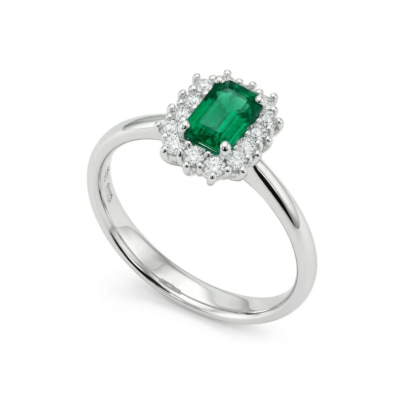 X-Diamond an 18kt smeraldo ottagonale 7x5 e lab.g.d. ct.1,28 totali, cen 0,86ct e contorno 0,42ct XXDACL057O4BE75