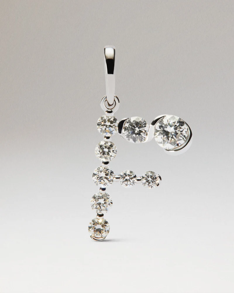 Diamonds and white gold F initial pendant
