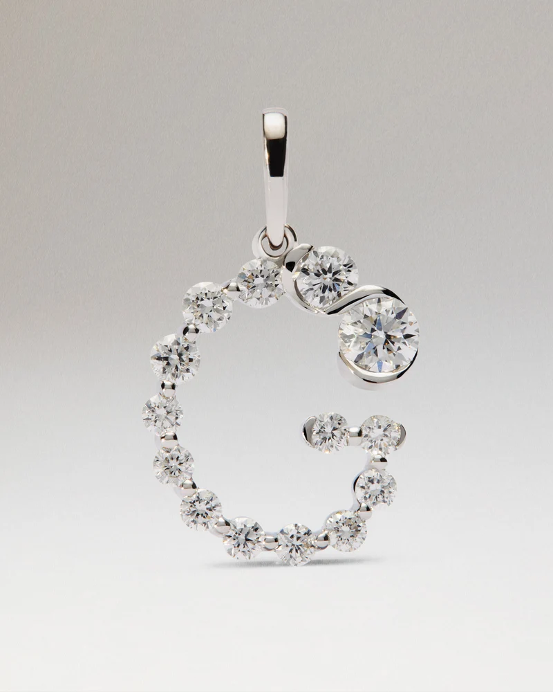Diamonds and white gold G initial pendant