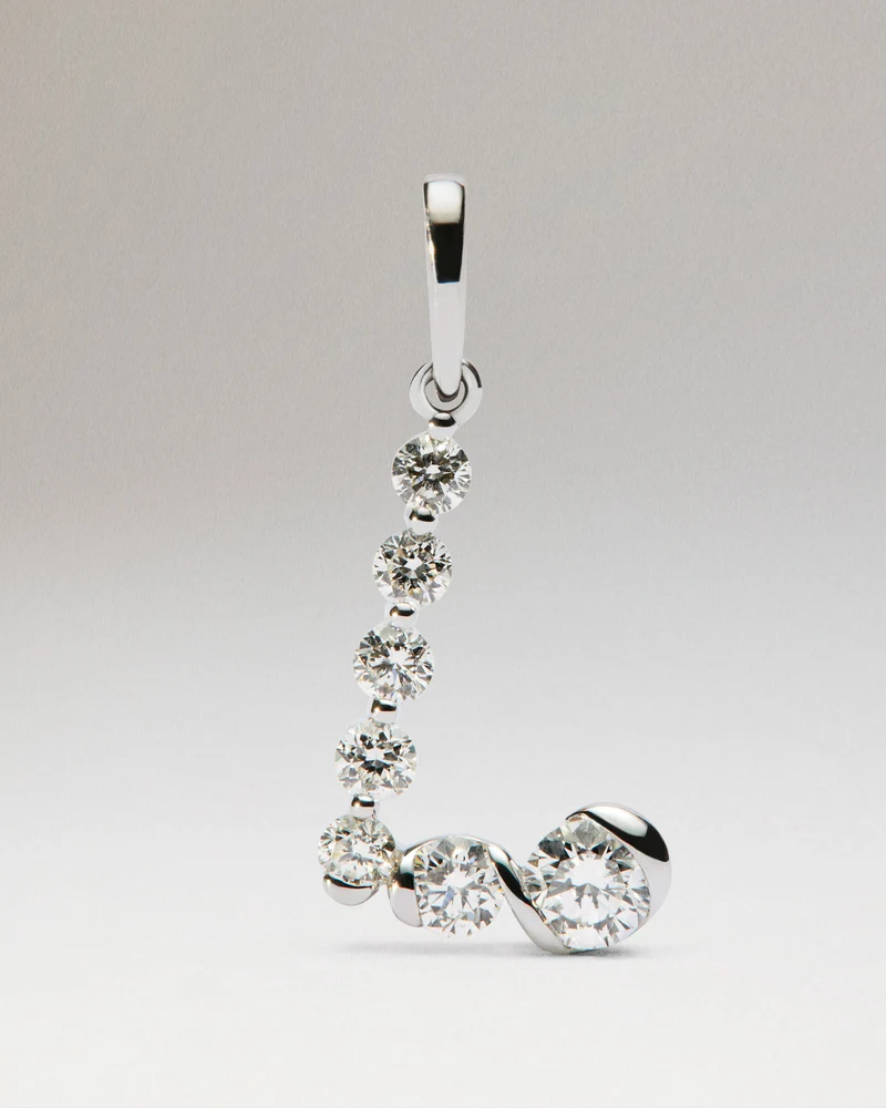 Diamonds and white gold L initial pendant