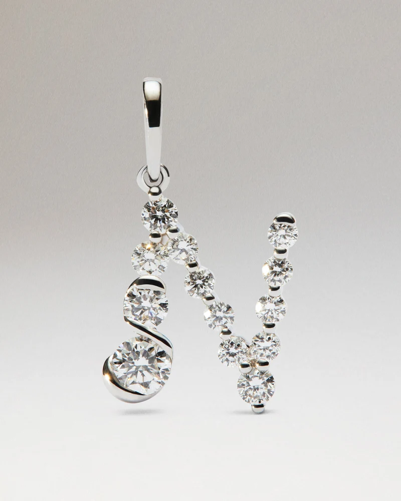 Diamonds and white gold N initial pendant