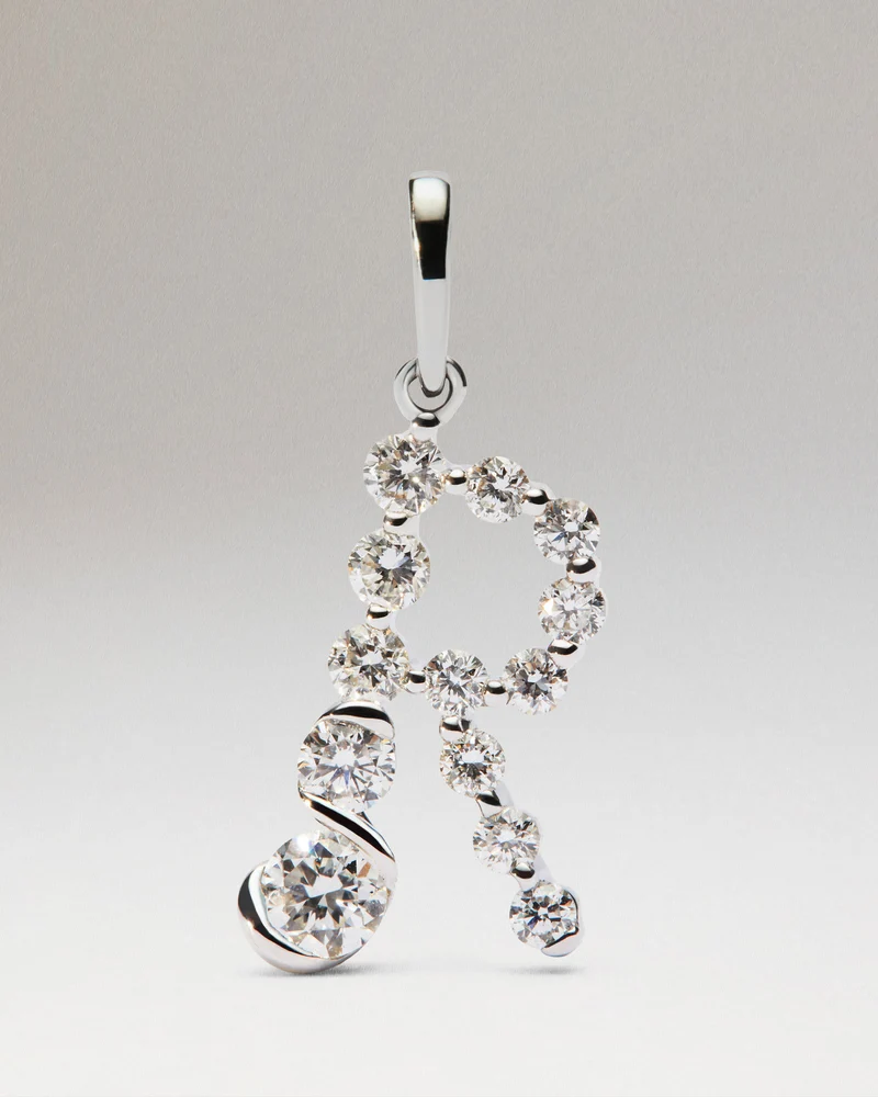 Diamonds and white gold R initial pendant
