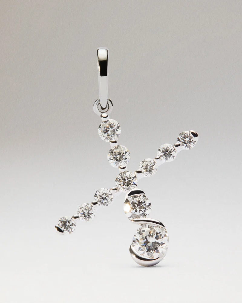 Diamonds and white gold X initial pendant