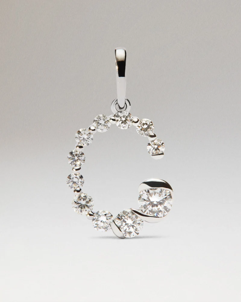 Diamonds and white gold C initial pendant