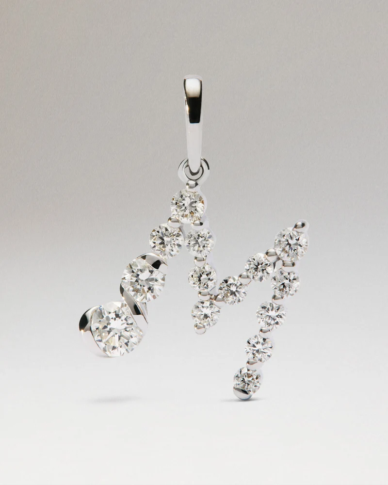 Diamonds and white gold M initial pendant