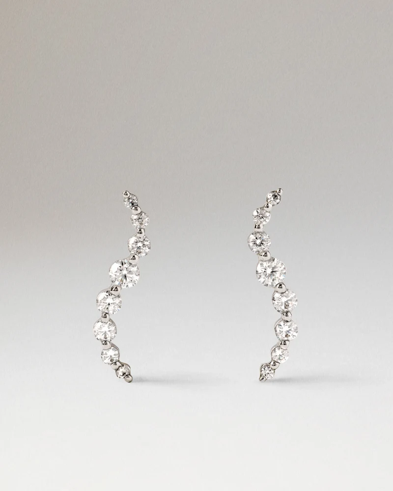 Diamonds and white gold Venus stud earrings