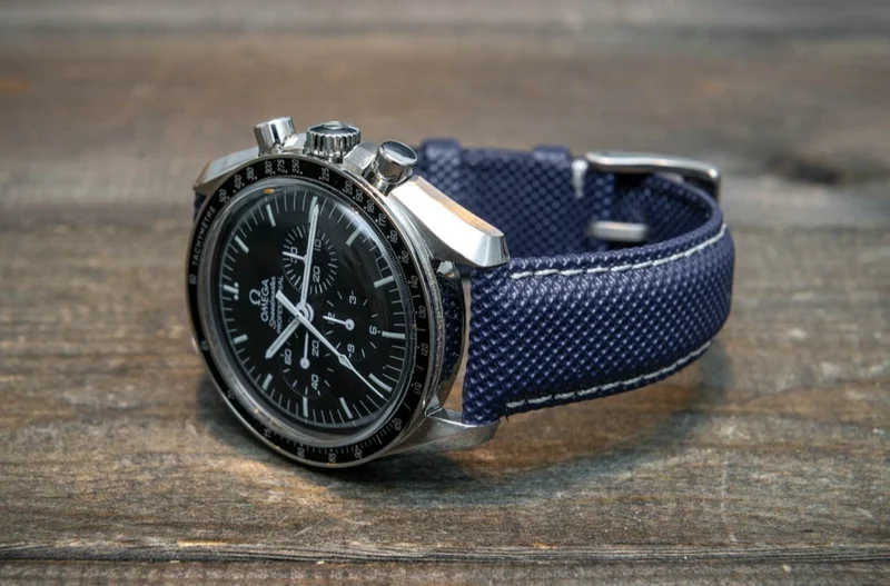 Sailcloth water-resistant watch strap 17-24 mm. Dark Blue with white stitching.