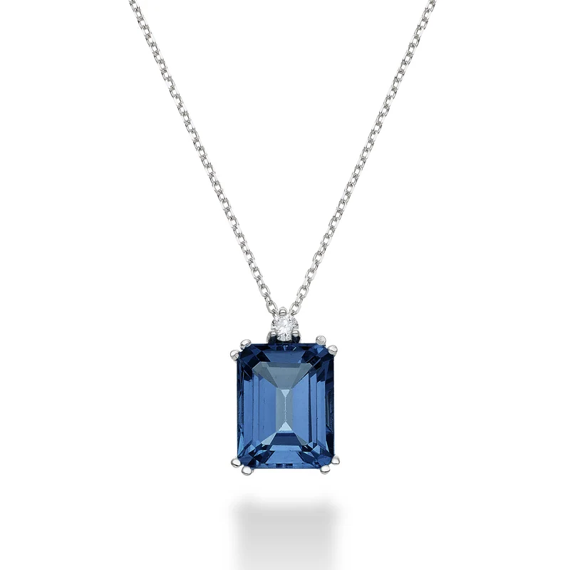 Nihama cl 18k topazio blu london ottagonale 7x9 ct.2,65 diam. ct.0,04 NPCL090DITPBL4O4