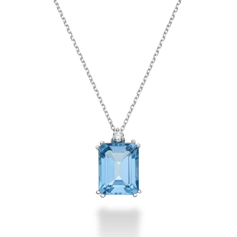 Nihama cl 18k topazio azzurro ottagonale 7x9 ct.2,90 diam. ct.0,04 NPCL090DITPAZ4O4