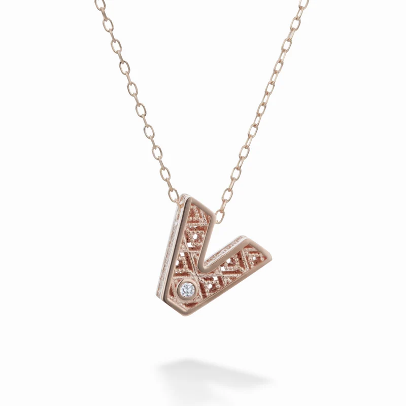 Nihama cl 18k lettera v oro rosè diam. ct.0,01 NDLETVO3