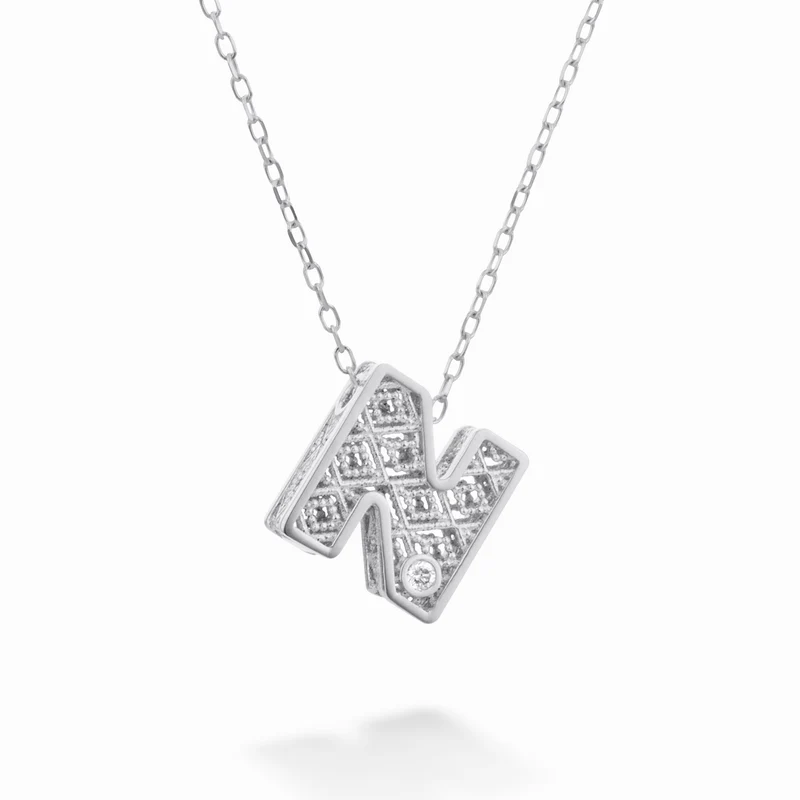 Nihama cl 18k lettera n oro bianco diam. ct.0,01 NDLETNO4