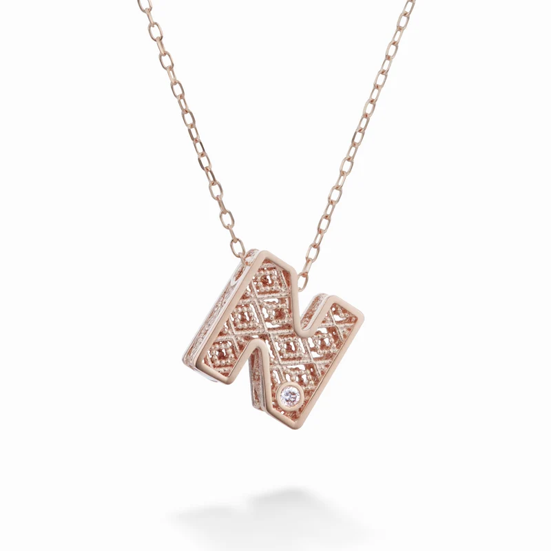 Nihama cl 18k lettera n oro rosè diam. ct.0,01 NDLETNO3