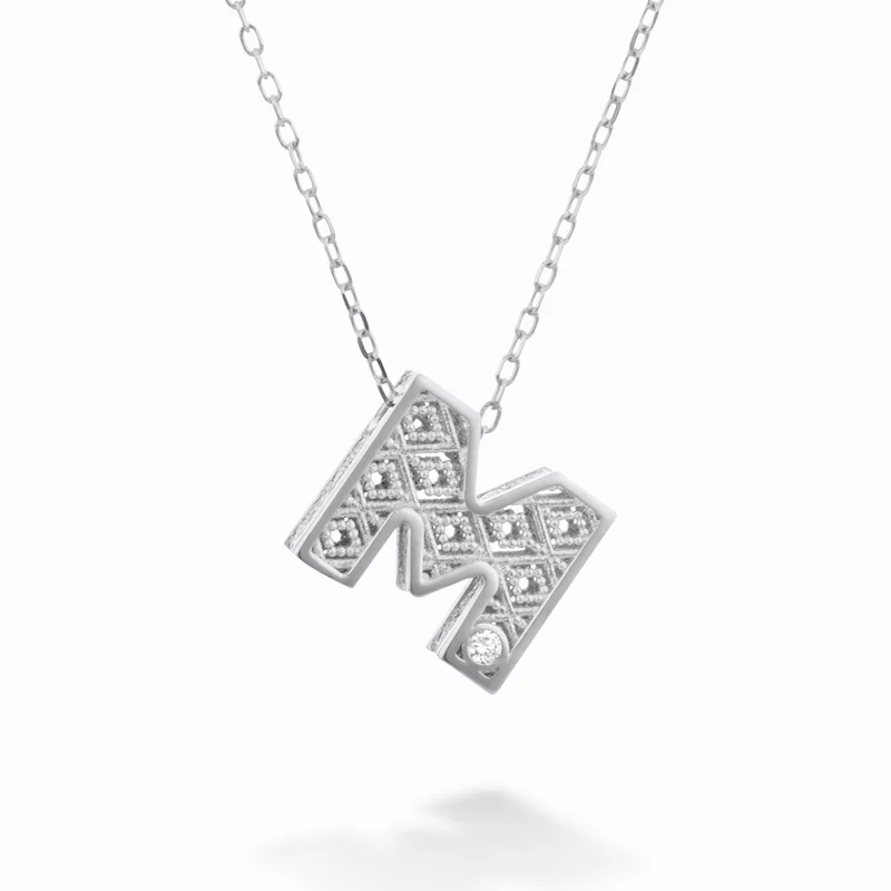 Nihama cl 18k lettera m oro bianco diam. ct.0,01 NDLETMO4