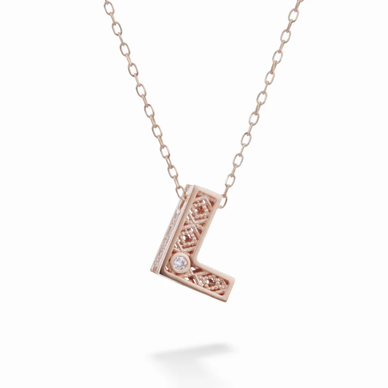 Nihama cl 18k lettera l oro rosè diam. ct.0,01 NDLETLO3