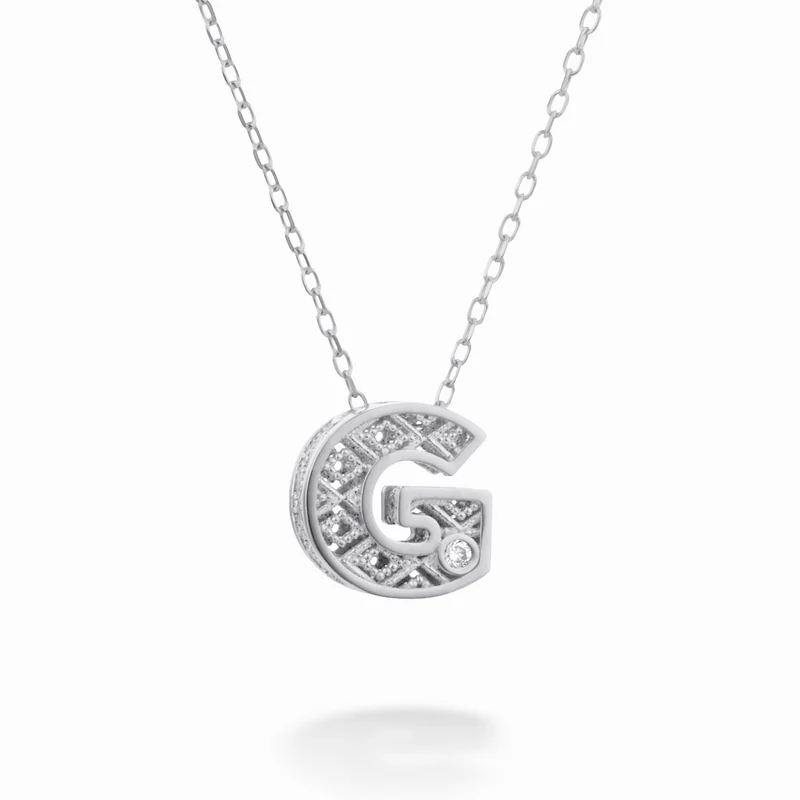Nihama cl 18k lettera g oro bianco diam. ct.0,01 NDLETGO4