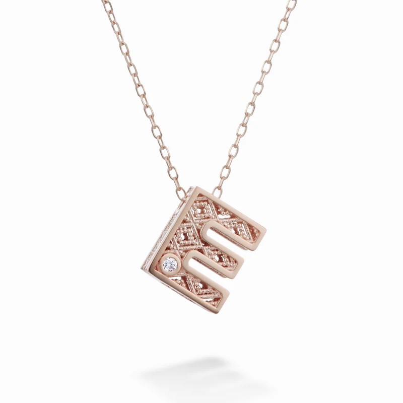 Nihama cl 18k lettera e oro rosè diam. ct.0,01 NDLETEO3