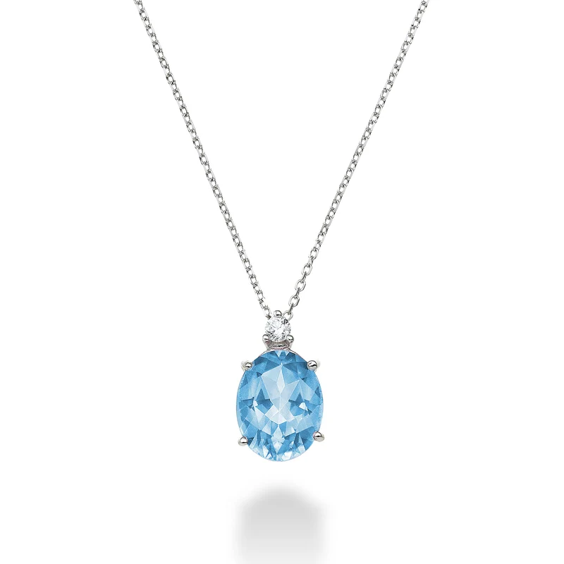 Nihama cl 18k topazio azzurro ovale 7x9 ct.2,10 diam. ct.0,04 ND5110O4TPAZ
