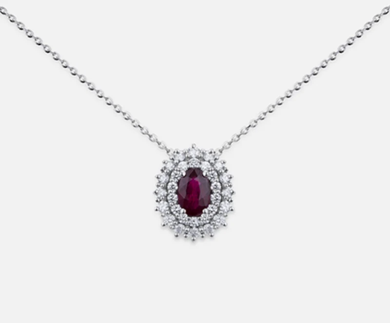 Nihama cl 18k rubino n. ovale 6x4 ct.0,52 dia ct.0,37 ND5060O4RBN052