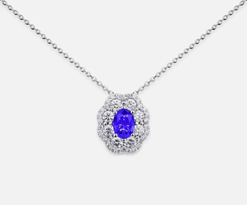 Nihama cl 18k tanzanite n. ovale 6x4 ct.0,38 dia ct.0,63 ND5057O4TZN