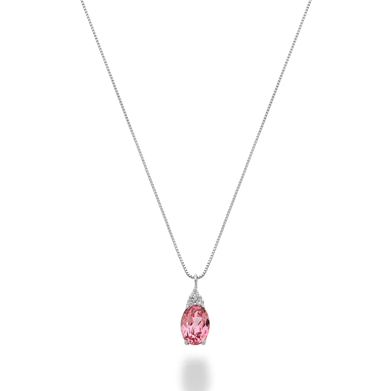 Nihama cl 18k zaffiro rosa ovale 6x4 con tre diamantini ND5188O4ZFRP