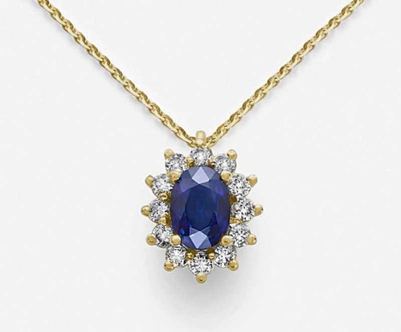 Nihama cl 18k zaffiro n. ovale 7x5 ct. 0,85 diam. ct.0,30 oro giallo ND5048O1ZFN085