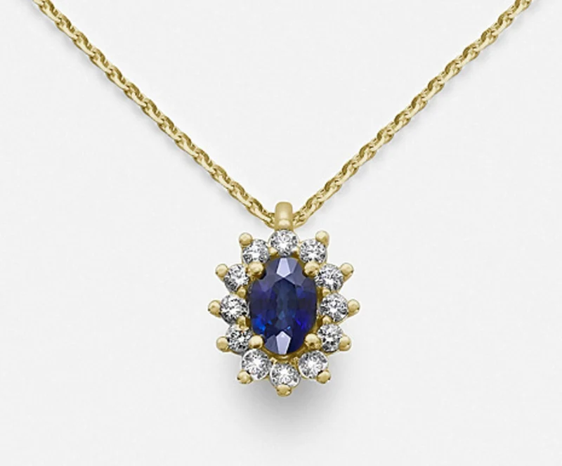 Nihama cl 18k zaffiro n. ovale 6x4 ct.0,62 diam. ct.0,23 oro giallo ND5047O1ZFN062