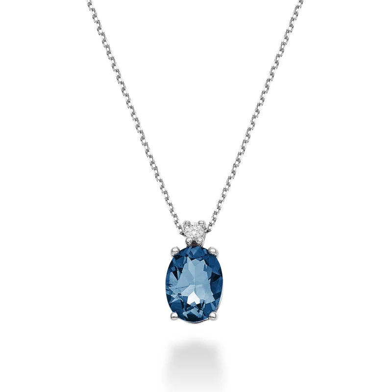 Nihama cl 18k topazio blu london ovale 8x6 ct.1,40 diam. ct.0,025 ND5036O4TPBL