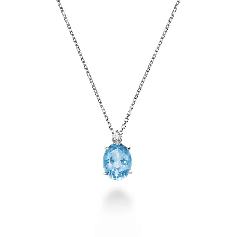 Nihama cl 18k topazio azzurro ovale 7x5 ct.1,10 diam. ct.0,015 ND5035O4TPAZ