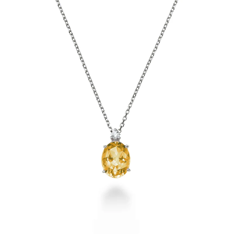 Nihama cl 18k citrino ovale 7x5 ct.0,60 diam. ct.0,015 ND5035O4CITR