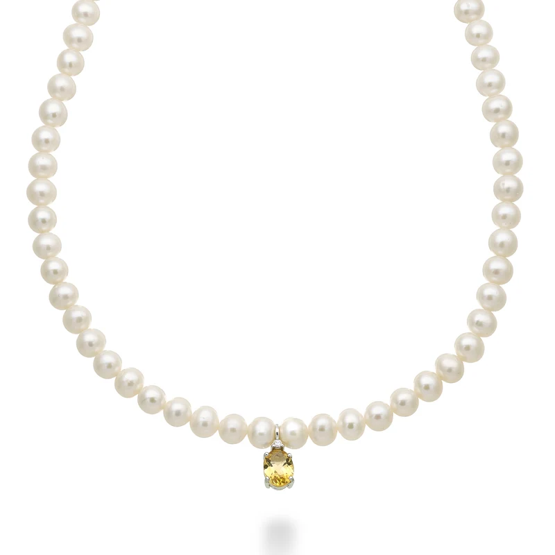 Nihama cl 18k fw 5,5/6 citrino ovale 6x8 ct.1,10 diam. ct.0,02 anellino a molla NC1576O4CITR55