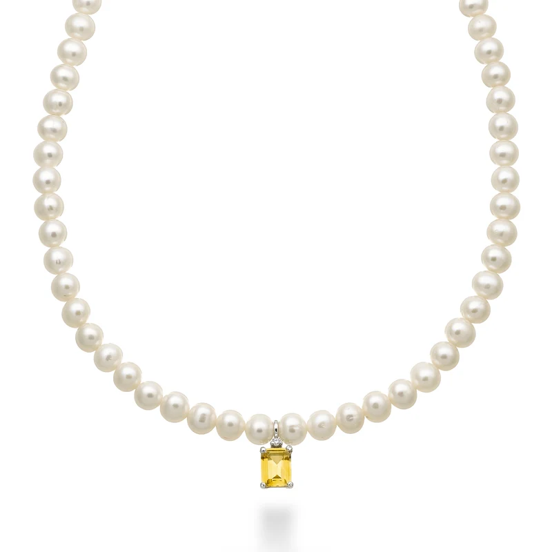 Nihama cl 18k fw 5,5/6 citrino ott. 6x8 ct.1,30 diam. ct.0,02 anellino a molla NC1575O4CITR55