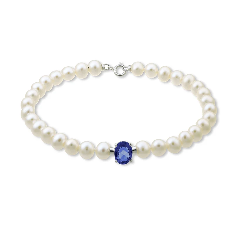 Nihama br 18k fw 5-5,5 topazio blu london ovale 6x8 ct.1,40 anellino a molla NB1017O4TPBL50