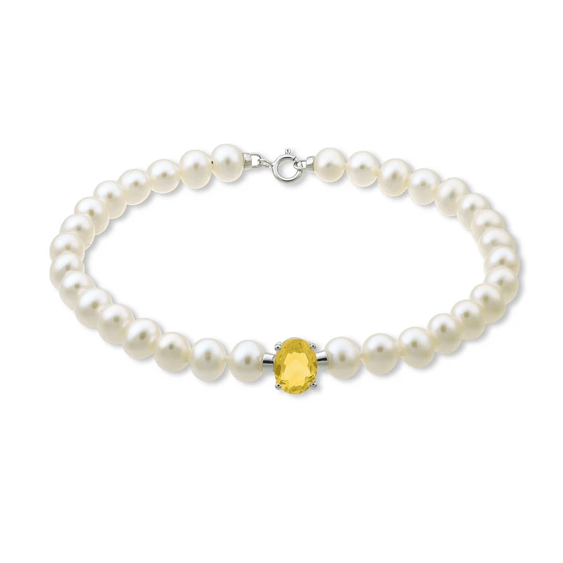 Nihama br 18k fw 5-5,5 citrino ovale 6x8 ct.1,10 anellino a molla NB1017O4CITR50