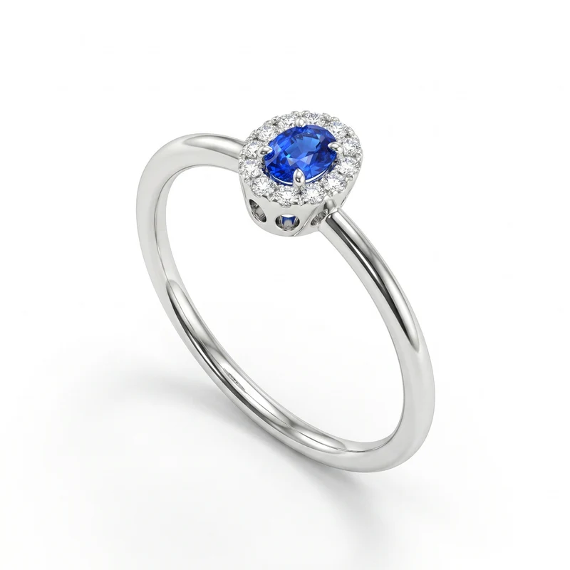Nihama an 18k zaffiro ovale 4x3 con contorno diamanti e gambo liscio NA5233O4ZFD