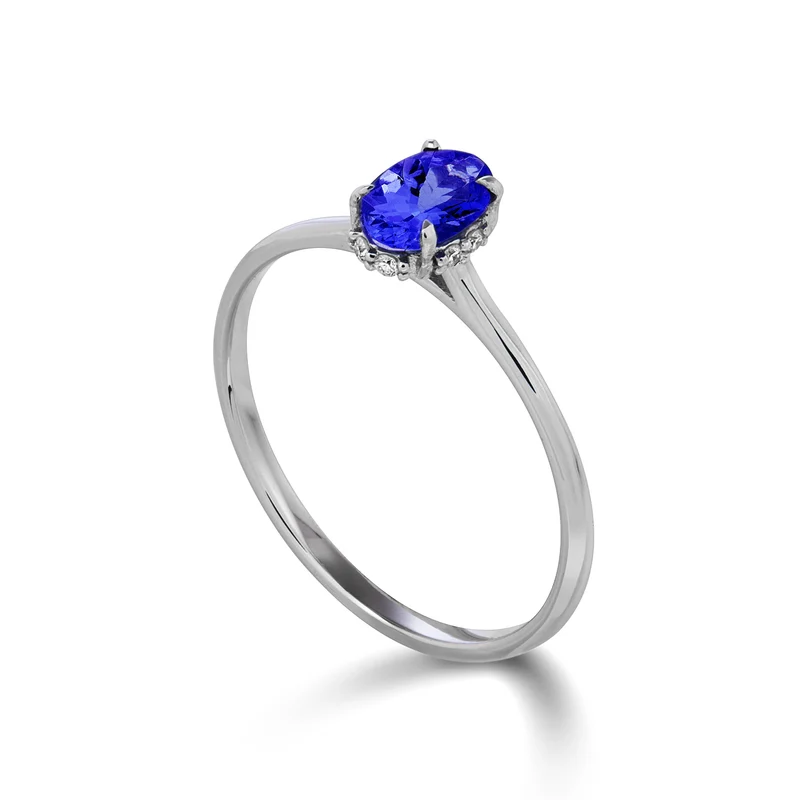 Nihama an 18k tanzanite ovale 6x4 aggiorno incassato con diamanti NA5219O4TZN