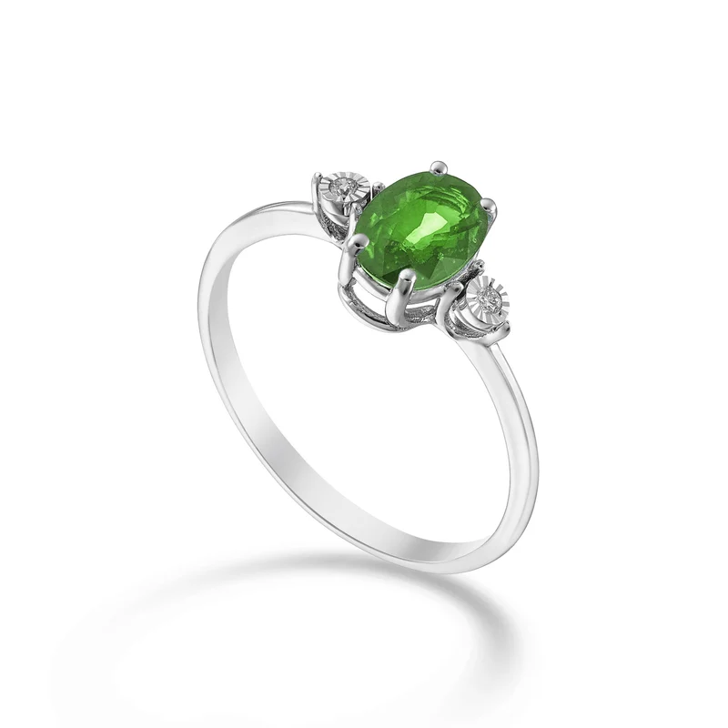Nihama an 9k smeraldo n. ovale 7x5 e diamantini laterali NA5213R4SMN070