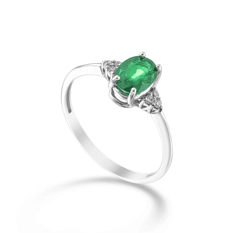 Nihama an 18k smeraldo n. ovale 7x5 e diamantini laterali NA5210O4SMN070