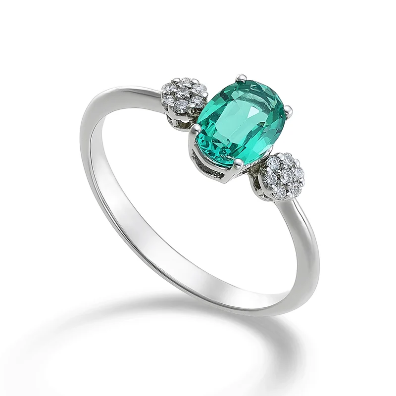 Nihama an 18k smeraldo ovale 7x5 ct.0,60 diam. ct.0,08 NA5058O4BE