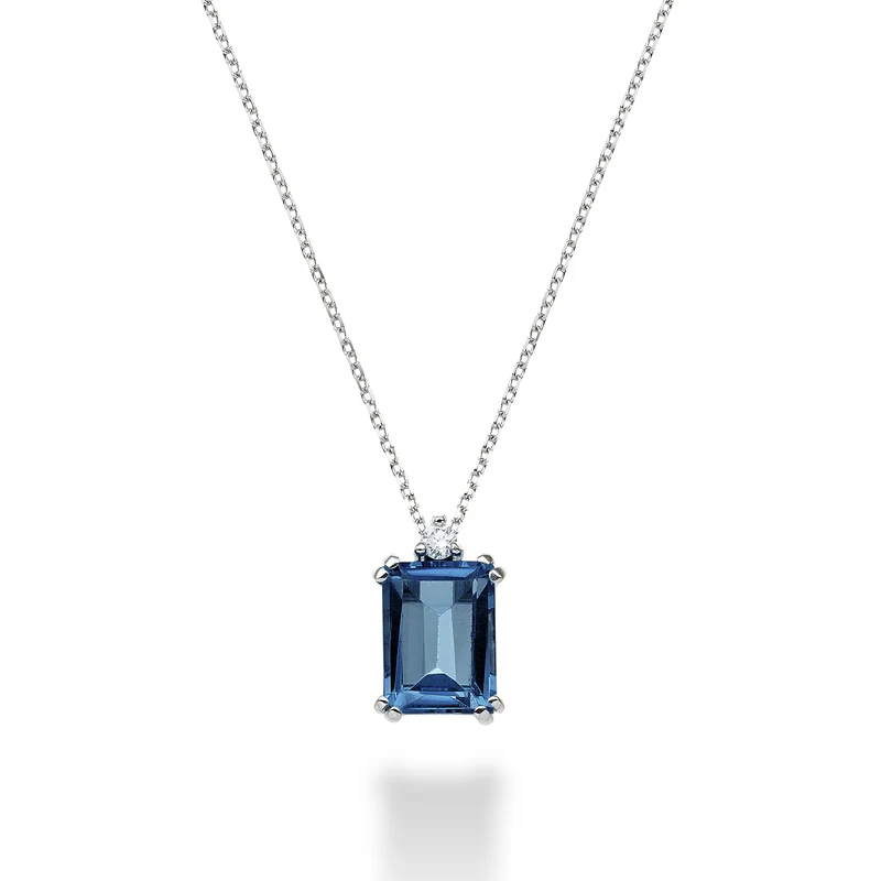 Mikiko cl 18k topazio blu london ottagonale 8x6 ct.2,65 diam. ct.0,03 MPCL090DITPBL3O4
