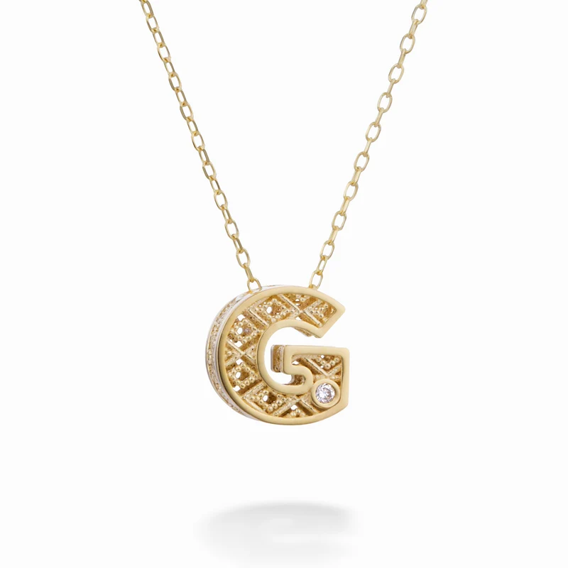 Mikiko cl 18k lettera g oro giallo diam. ct.0,01 MDLETGO1