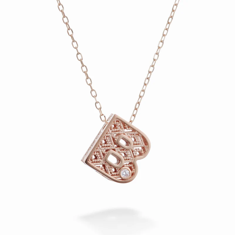 Mikiko cl 18k lettera b oro rosè diam. ct.0,01 MDLETBO3