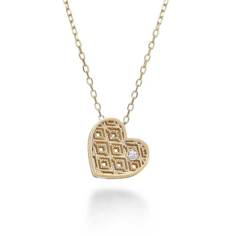 Mikiko cl 18k cuore oro giallo diam. ct.0,01 MDCUOREO1