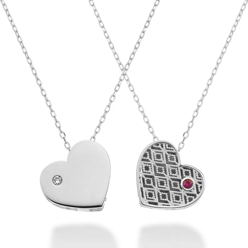 Mikiko cl 18k cuore medio un lato lucido oro bianco diam. ct.0,01 rubino ct.0,01 MDCUOREMLO4