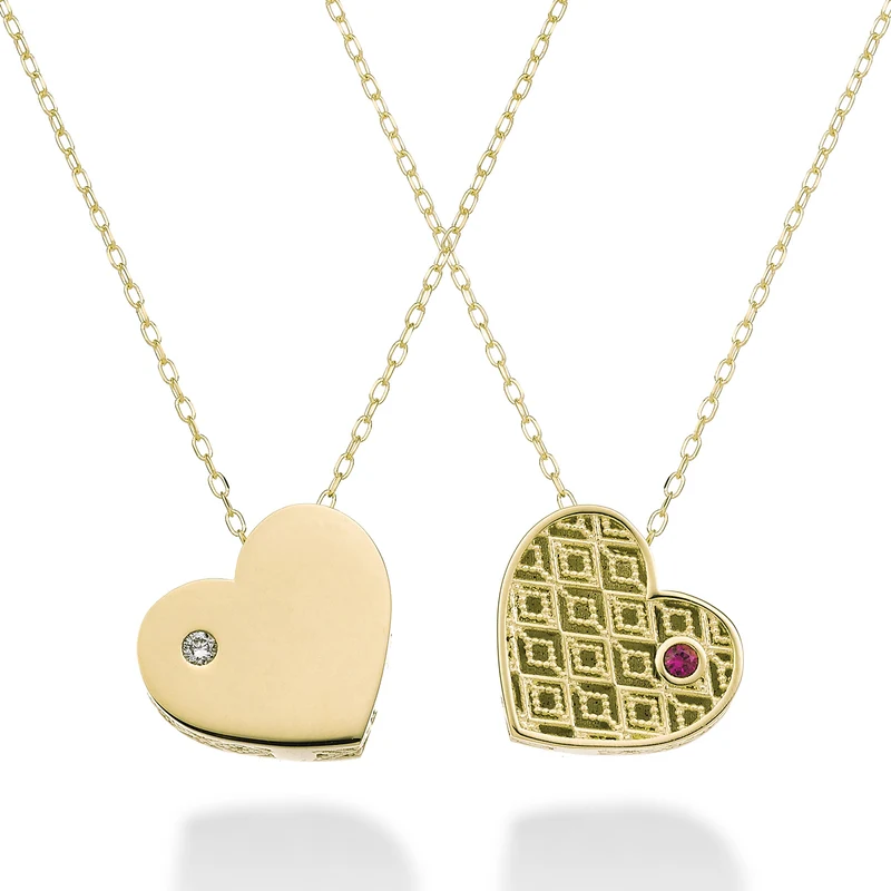 Mikiko cl 18k cuore medio un lato lucido oro giallo diam. ct.0,01 rubino ct.0,01 MDCUOREMLO1