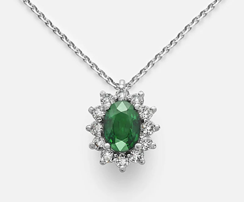 Mikiko cl 18k smeraldo ovale 7x5 ct.0,60 diam. ct.0,30 MD5048O4BE