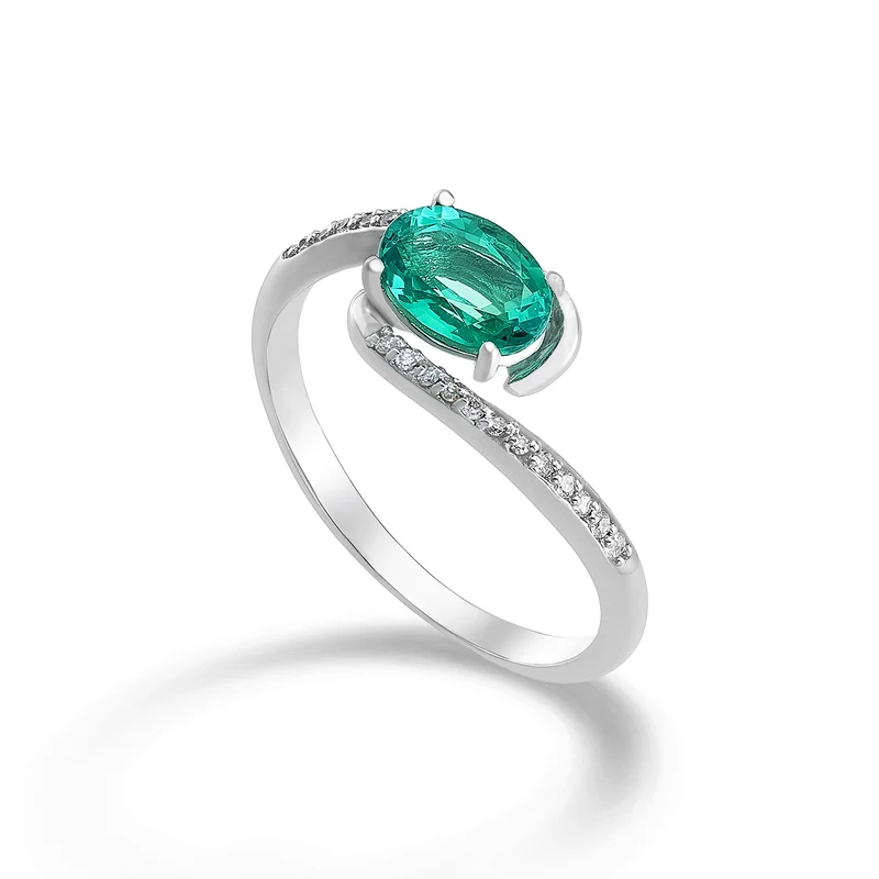 Mikiko an 18k smeraldo ovale 7x5 ct.0,60 diam. ct.0,085 MA5101O4BE