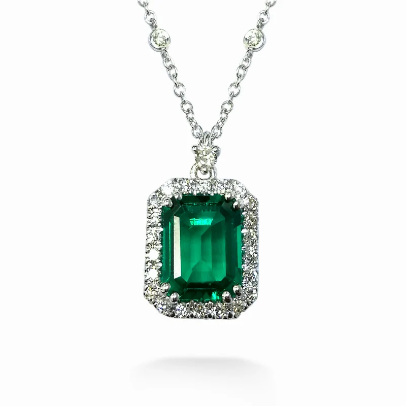 X-Diamond cl 18kt lab g.d. smeraldo lab ottagonale 7x9 ct. 2,25 circa e contorno diam ct. 0,38 LXDPCL072DISM79O4