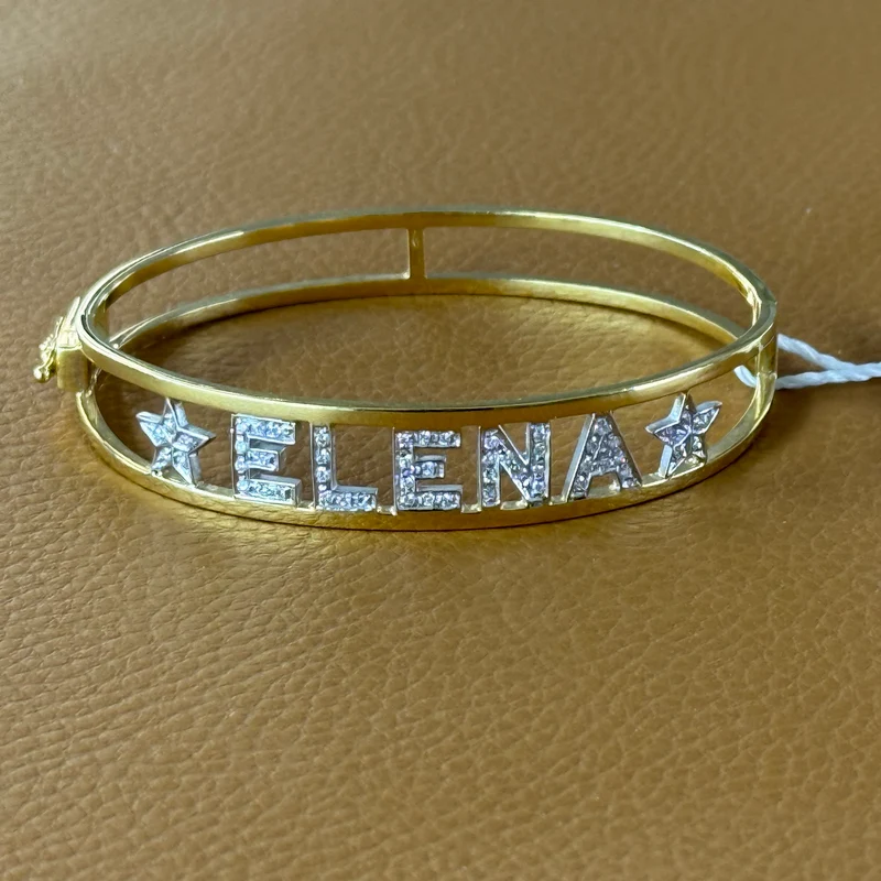Bracciale in oro giallo e diamanti con scritta ELENA